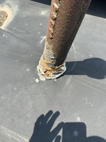 This is what the perma boot on the back right section of the roof looked like before we replaced it.