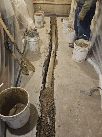 During: Our Foreman, Juan, and his crew secured the waterproofing products throughout the basement.