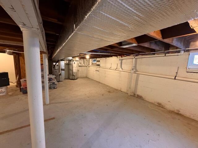 Basement walls in Metuchen, NJ showed signs of water intrusion during rains. Without a waterproofing system in place, the space was damp and vulnerable to future leaks.