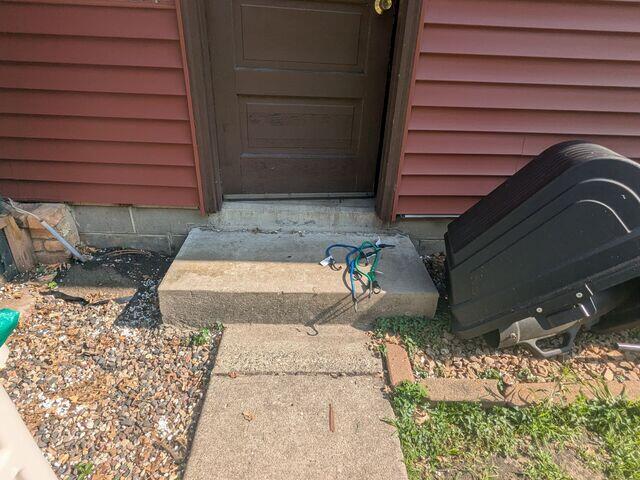 Before: Kyle, one of our Design Specialists, recommended lifting the sinking slabs back into place.