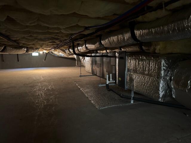 The crawl space was damp, dark, and unprotected, allowing moisture and humidity to rise into the home.