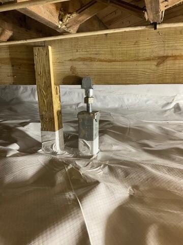 Our SmartJack Support System was installed to stabilize this homeowner's weakened crawl space by providing strong, adjustable support to sagging beams, restoring structural integrity and preventing further settlement.