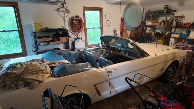 The homeowner was kind enough to show us their classic Mustang convertible sitting in their garage. No way you could risk driving this car over that mess of a driveway beforehand. What a beauty.