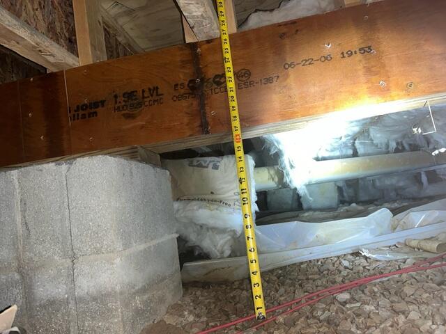 This photo, also taken by Joey, shows just how tight the crawl space was in some spots. Our crew was ready for the challenge.