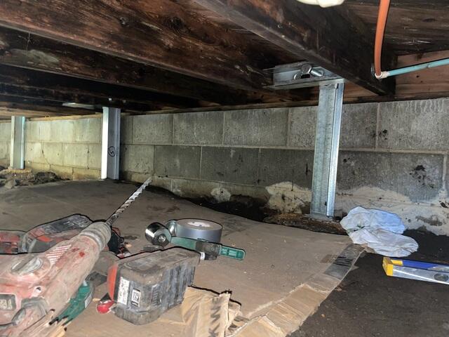 During: Our Foreman, Kingsley, and his crew secured the SmartJacks and PowerBraces throughout the crawl space.