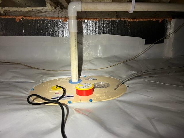 Next, the crew installed our TripleSafe Sump Pump System to provide reliable, triple-layer protection against water intrusion, ensuring this crawl space stays dry even during heavy rains or power outages.