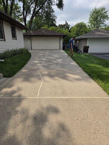 After: Our crew lifted the slabs and applied NexusPro along the joints and cracks