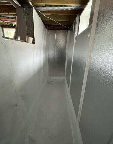 Our crew did a great job with navigating this narrow space, check out how they seamlessly installed our CleanSpace vapor barrier.