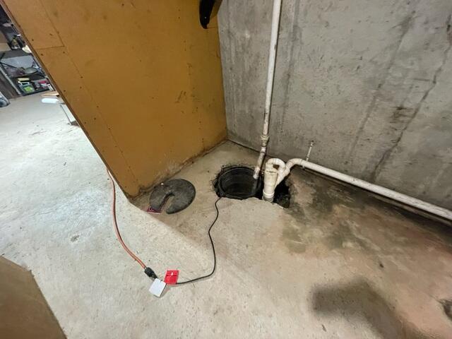 Before: Our Design Specialist, Romeo, recommended waterproofing and installing a Radon Mitigation System in the home.
