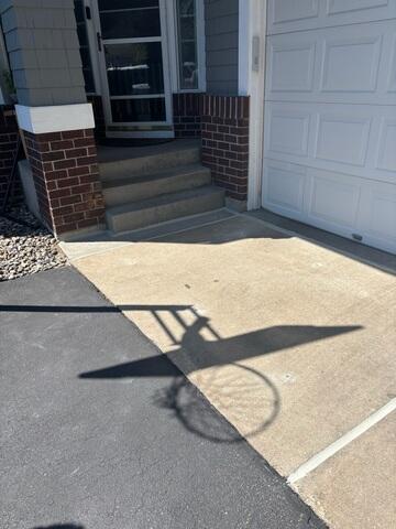 After: the crew lifted the concrete slabs and sealed the joints