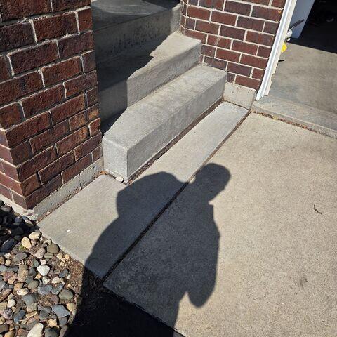 Before: the slabs in front of the step had begun sinking