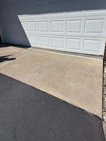 After: The crew lifting and leveling the concrete and sealing the joints