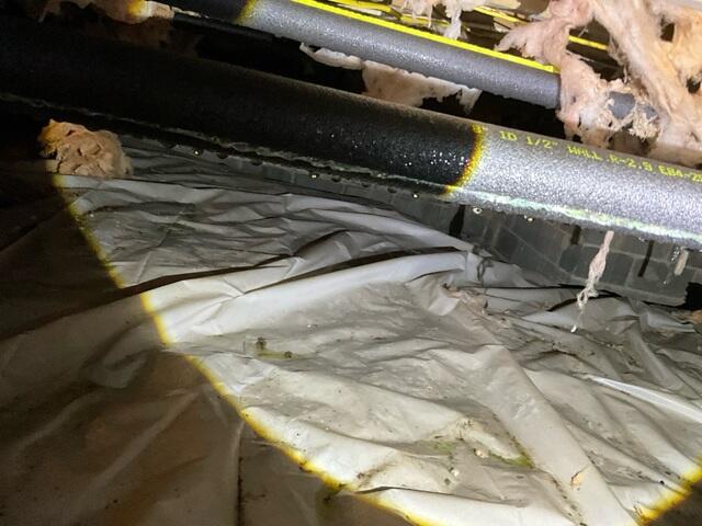 Moisture issues in Crawl Space are apparent on the pipes