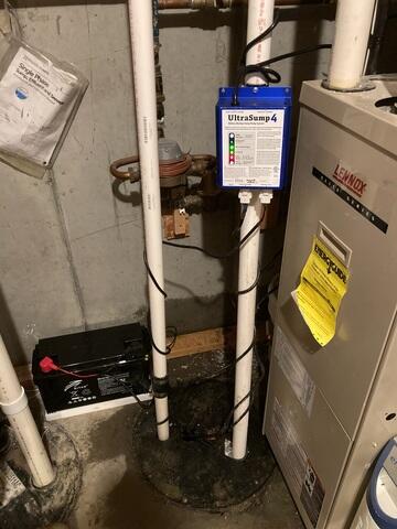 Our crew replaced the pumps in the homeowner's sump pump basket with Zoeller and UltraSump
