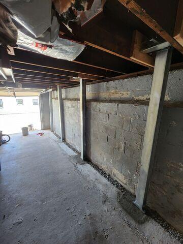 Our PowerBrace System was installed to stabilize bowing foundation walls. These steel I-beams provide immediate structural support and can be adjusted over time to help straighten the walls back to their original position.