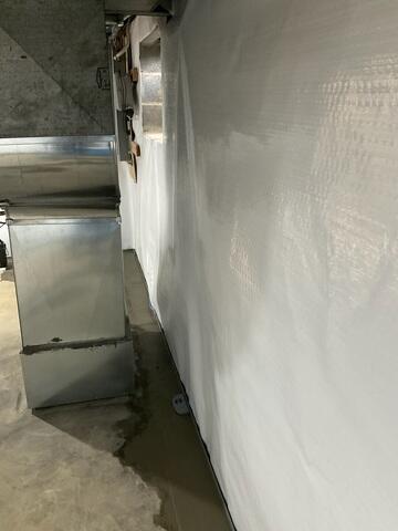 We installed our WaterGuard Drainage System to capture groundwater before it reaches the basement floor. Positioned along the perimeter, this system effectively directs water to the sump pump, preventing seepage and long-term foundation damage.