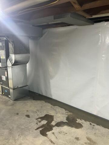 The crew also installed CleanSpace Wall Panels to act as a vapor barrier, blocking moisture from entering through the walls while also giving the basement a clean, finished appearance that improves overall air quality and comfort.