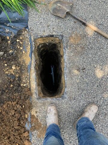 During: Our Foreman, Luis, and his crew worked on securing the GeoLocks outside the home.