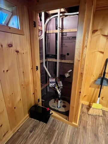 In the basement, the sump pump system has been upgraded to our TripleSafe Sump Pump.