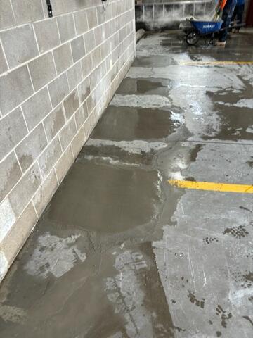 We then patched the piers with concrete after the install. Our piers ended up completely concealed from the floor, and the concrete cured over time.