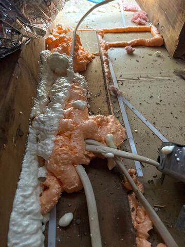 Here's what the top plates with the wiring holes look like after we've sealed them prior to insulating.