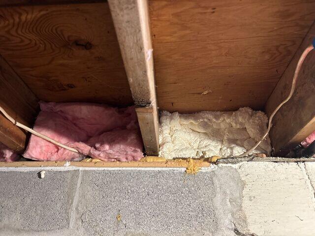 And finally, here's a side-by-side of the basement rims. The one on the left was the original fiberglass batt. You can see how that doesn't stop outside air from leaking around the batt. The one on the right is filled with expanding spray foam so it is air tight and well insulated.