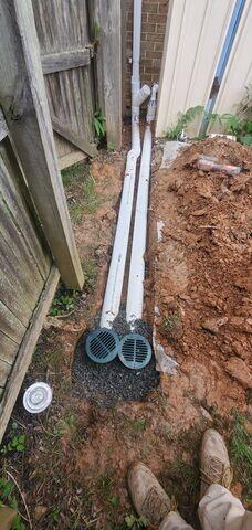 Yard Drainage installed to pull water away from the foundation of the home.