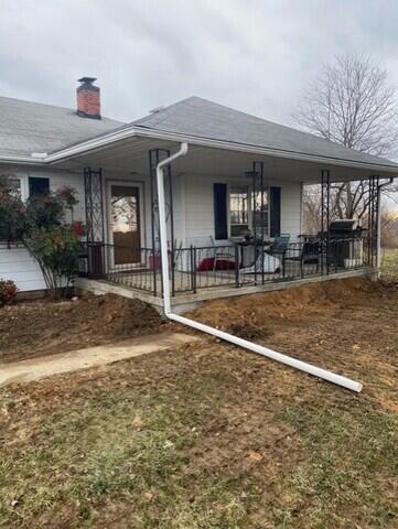 This was what the porch looked like after we lifted it. We also backfilled the piers with the soil we dug up to expose the footing.