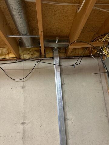 During: Kiko and his crew secured 9 PowerBraces along the south wall.