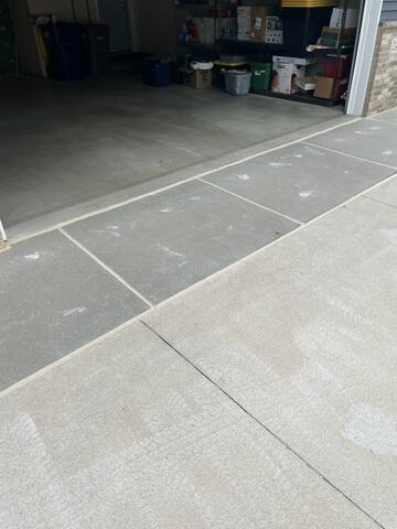 During: The Design Specialist recommended inserting PolyLevel below the sinking slabs.