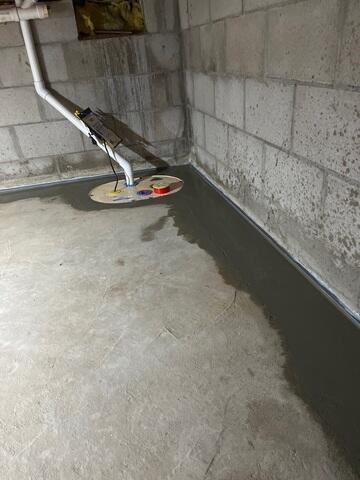 After our crew installed SuperSump+ and WaterGuard, the flooring was restored