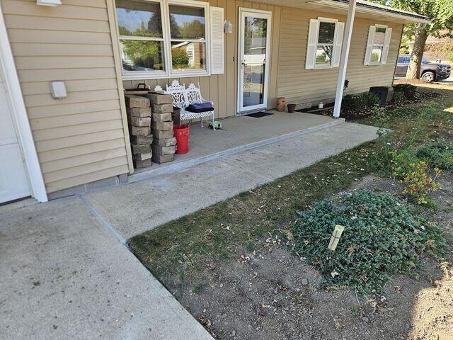 After we leveled the sidewalk out with PolyLevel, we then used our NexusPro sealant again to seal the control joints and the space between the sidewalk and the front porch slab. If you have sunken concrete, our PolyLevel foam jacking method is a great alternative to concrete replacement or mudjacking.