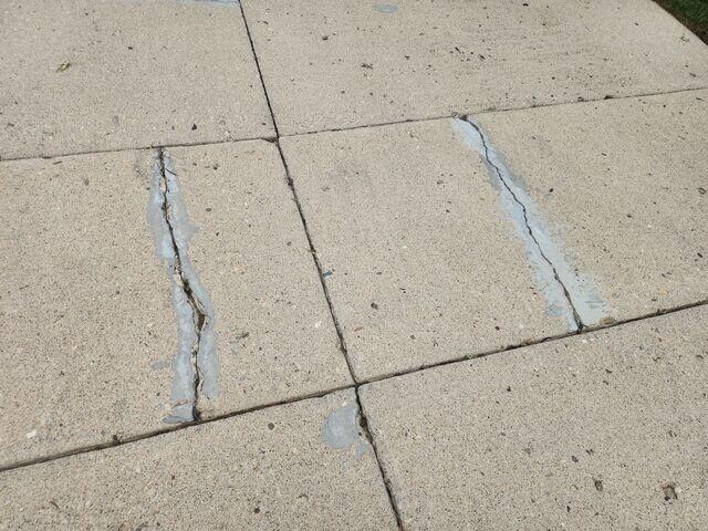 This photo, also taken upon the initial inspection shows the depth of some of the cracks. The bix box store sealant couldn't stretch to keep up with the freeze-thaw cycles, and was melted away by UV rays. The harsh weather cycles of Northern Ohio put this sealant through the ringer.