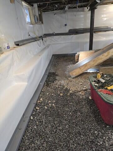 To combat ongoing water seepage, our crew installed the WaterGuard Drainage System to redirect water away from the foundation and added our CleanSpace Vapor Barrier to seal out moisture, creating a dry, protected environment below the home