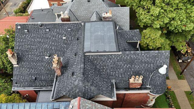 You can see the rubber roofing section that we also replaced with an EPDM finish. You can also see the finished turret section from this photo.