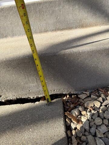 A close-up of the gap that has formed at the step