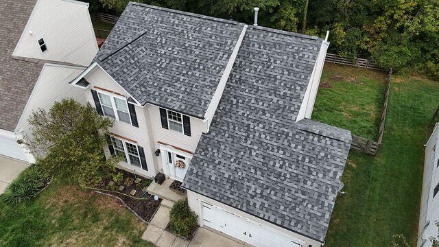 This photo shows the IKO Dynasty - Summit Gray colored shingles we used to replace the roof. These shingles are class three rated against wind & hail damage.
