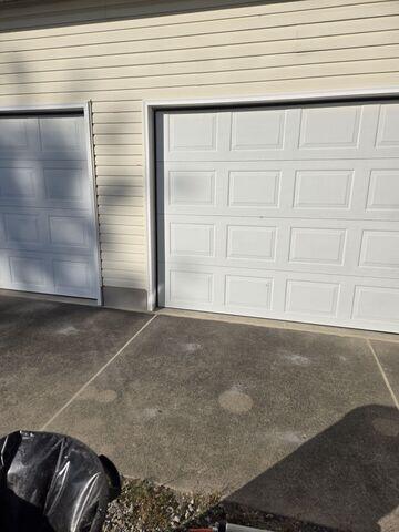 During: Our Foreman, Sam, and his crew successfully lifted the garage apron back into place.