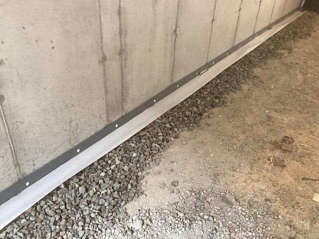 The WaterGuard drainage system was installed on both sides of the garage to collect groundwater.