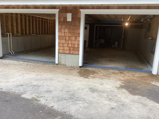 The Spee-D Channel and TripleSafe were both covered in tape to keep them clean when the concrete is poured for the garage floor.