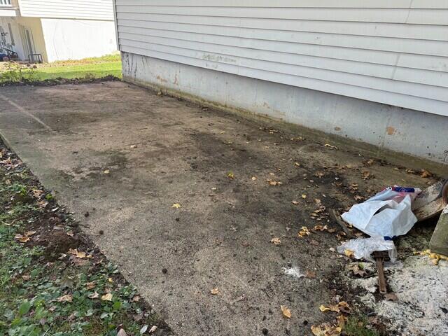 This backyard patio in Newark, DE had sunk nearly 6 inches, leaving the surface uneven, cracked, and unsafe for use.