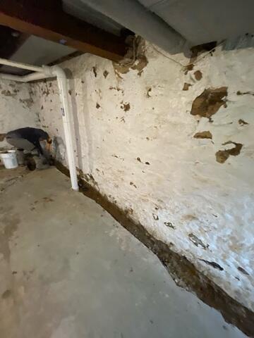 During: Our Foreman, Victor, and his crew worked hard to secure all the products throughout the basement.