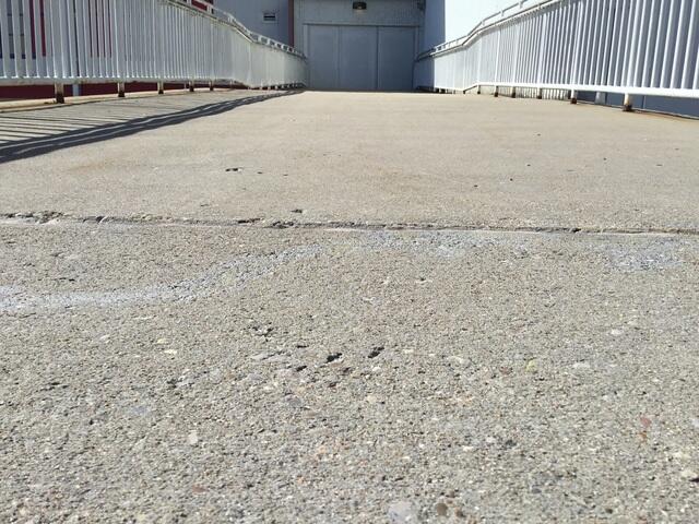 Now that the ramp is even again, the workers can get back to business as usual.