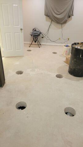 This photo shows a room with all the slab piers installed.