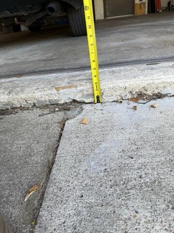 Before: Our Foreman, Nathan, noted the concrete was lowering due to settlement.