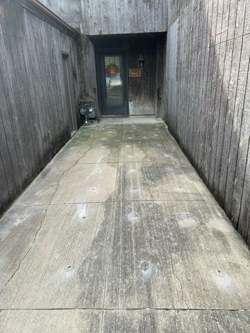 During: Our Foreman, Patrick, and his crew inserted PolyLevel below the sinking concrete slabs.