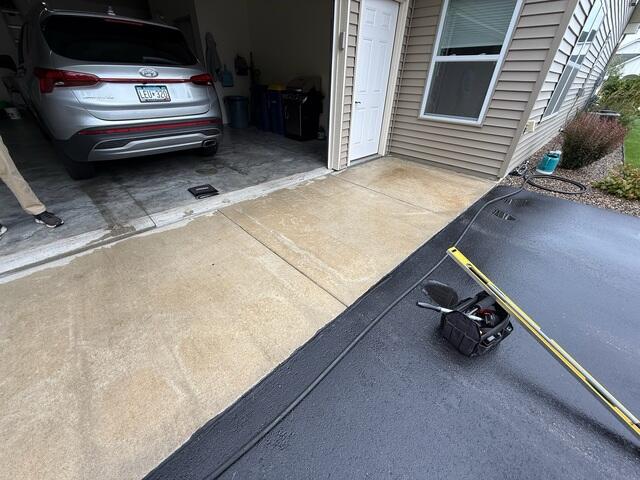 The concrete slabs on top of the driveway before the installation