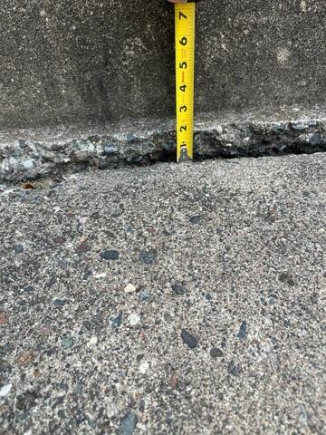 A close up of how far the slabs have sunken