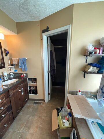To access the plumbing and fix the leak, a big hole was cut in the wall.