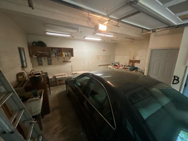 Water intrusion in garage from cracks on foundation